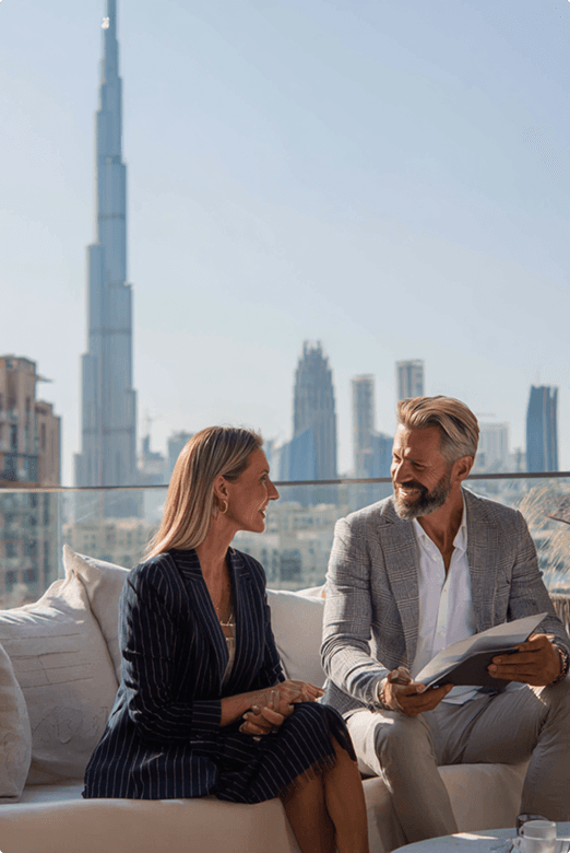 Real estate professionals reviewing documents